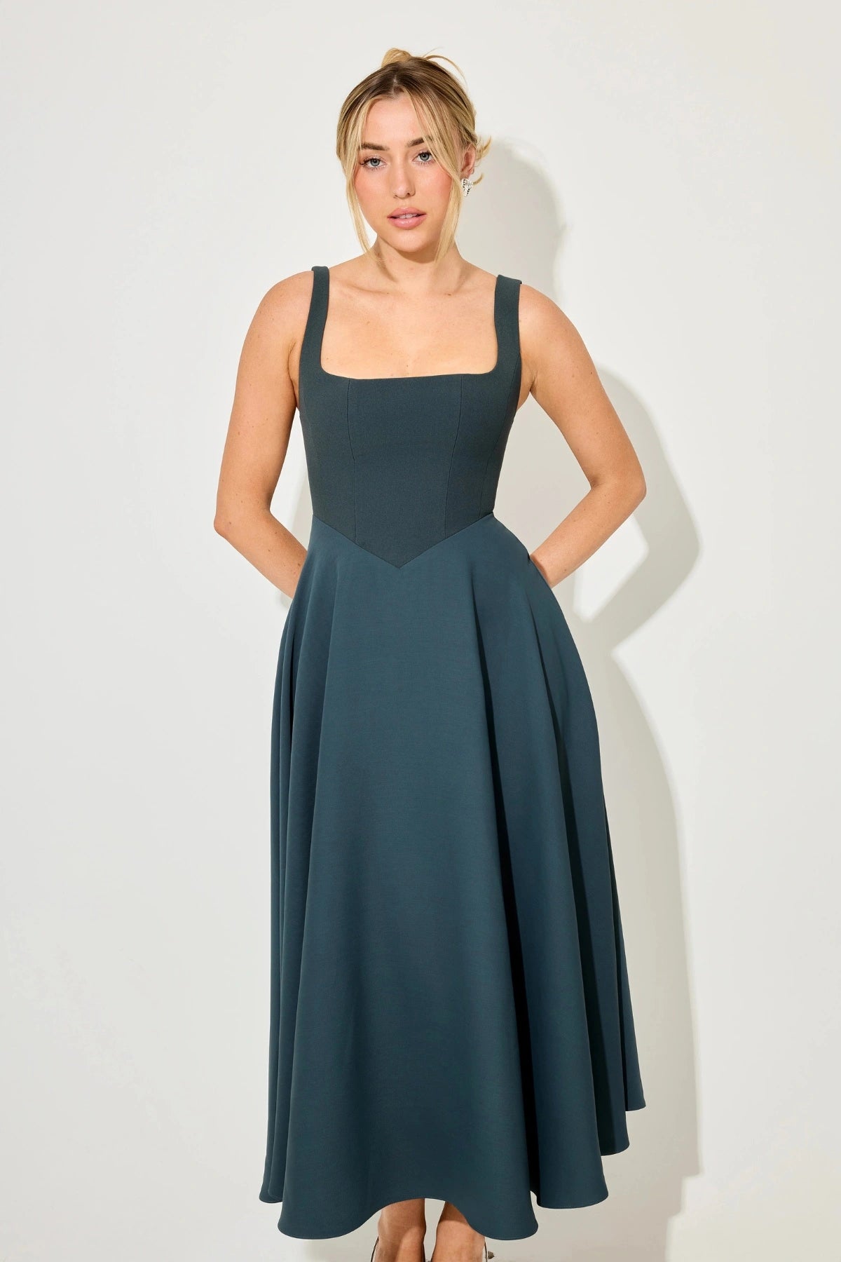 Square Neck Midi Dress by Odd Muse, bold teal midi with structured neckline and tailored fit. Ideal for elegant party season looks.