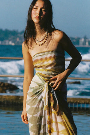Square Pareo Aurora by Soleil Soleil - organic cotton square pareo with geometric print, designed for versatile beach and resort styling.