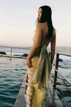 Square Pareo Aurora by Soleil Soleil - organic cotton square pareo with geometric print, designed for versatile beach and resort styling.