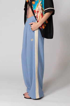 Steel Blue Knitted Baggy Pants by Something Very Special, featuring stripe jacquard and tonal embroidery. Unisex comfort redefined.