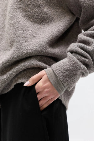 Stella Crew Neck Beige Grey by Bayse – relaxed wool blend knit with brushed texture and classic crew neckline.