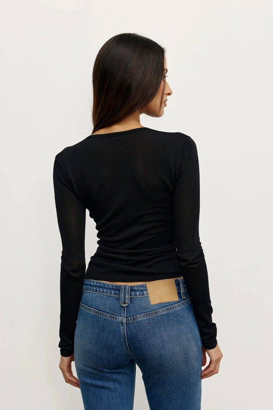 Stevie Top Black by Bayse – semi sheer long sleeve top with crew neckline and body-skimming fit.