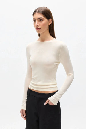 Stevie Top Ivory by Bayse – semi sheer long sleeve top with crew neckline and body-skimming fit.
