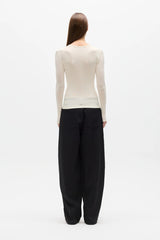 Stevie Top Ivory by Bayse – semi sheer long sleeve top with crew neckline and body-skimming fit.