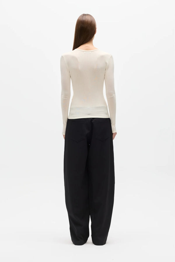 Stevie Top Ivory by Bayse – semi sheer long sleeve top with crew neckline and body-skimming fit.