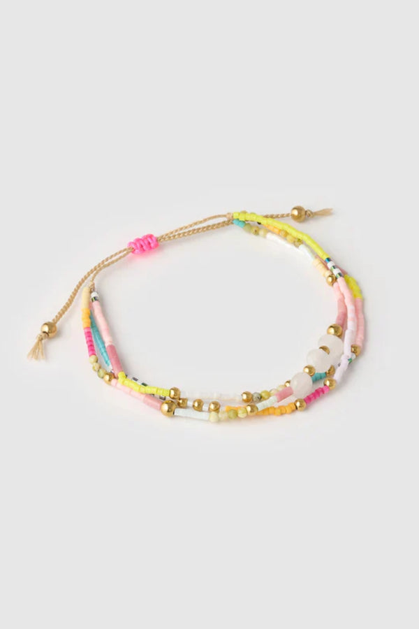 Summer Bracelet by Arms of Eve, colourful and gold-beaded design that radiates playful vacay energy and adds brightness to any stack.