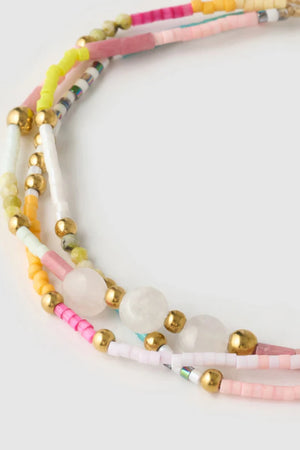 Summer Bracelet by Arms of Eve, colourful and gold-beaded design that radiates playful vacay energy and adds brightness to any stack.