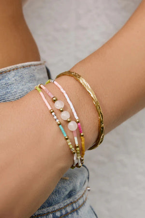 Summer Bracelet by Arms of Eve, colourful and gold-beaded design that radiates playful vacay energy and adds brightness to any stack.