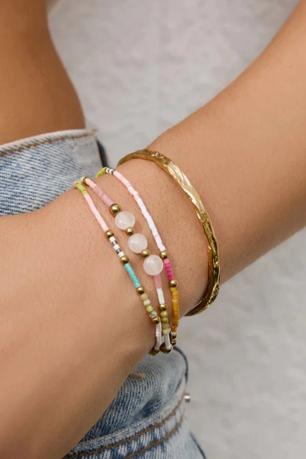 Summer Bracelet by Arms of Eve, colourful and gold-beaded design that radiates playful vacay energy and adds brightness to any stack.