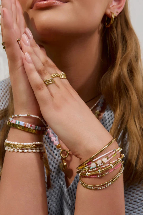 Summer Bracelet by Arms of Eve, colourful and gold-beaded design that radiates playful vacay energy and adds brightness to any stack.