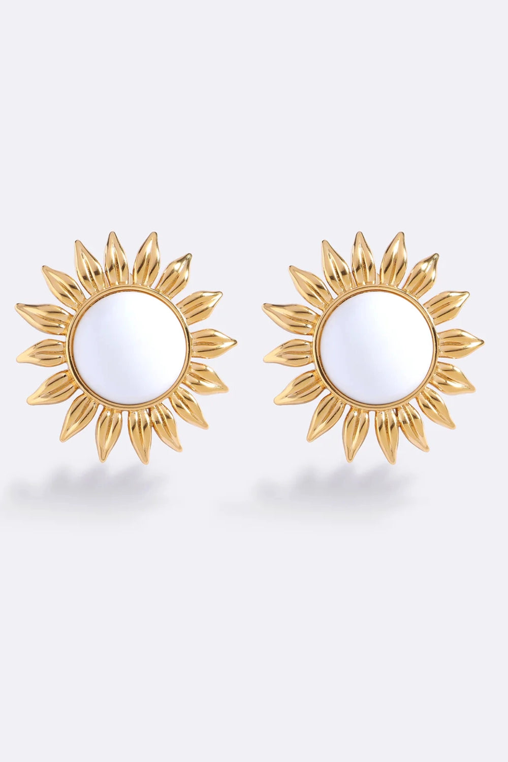 Summer Starts In Monaco White Glo by Emma Pills – gold plated sunburst earrings with white enamel centre.
