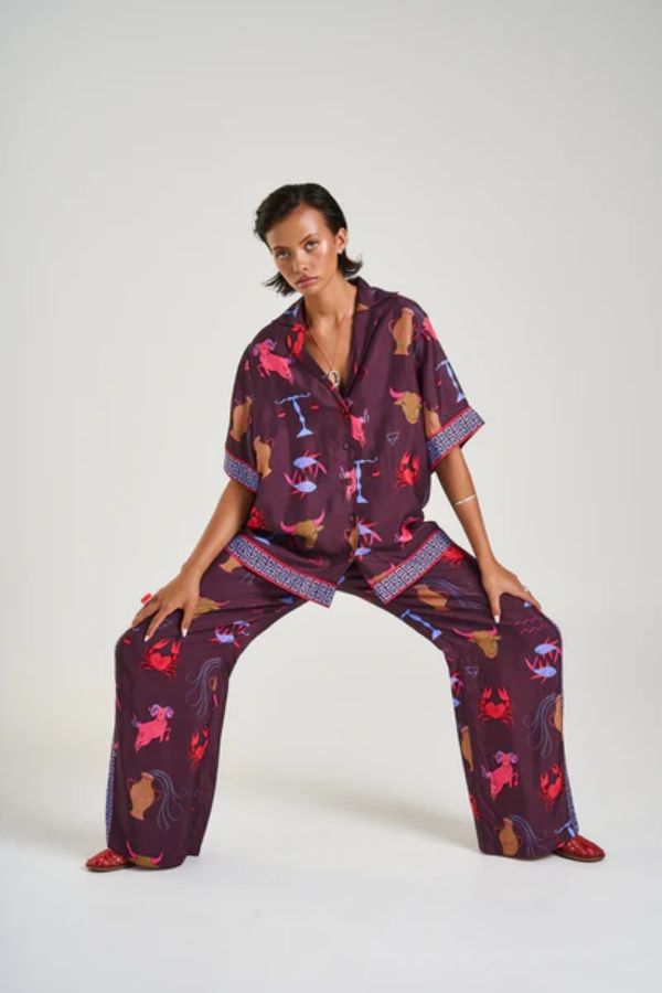 Wide Leg Pants in Zodiac Zod by Summi Summi, relaxed wide-leg pants with Zodiac print and SS trim, perfect for pairing with the matching oversized shirt or a simple top for an elevated lounge-to-street look.