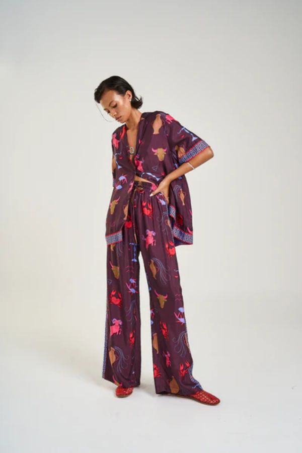 Wide Leg Pants in Zodiac Zod by Summi Summi, relaxed wide-leg pants with Zodiac print and SS trim, perfect for pairing with the matching oversized shirt or a simple top for an elevated lounge-to-street look.