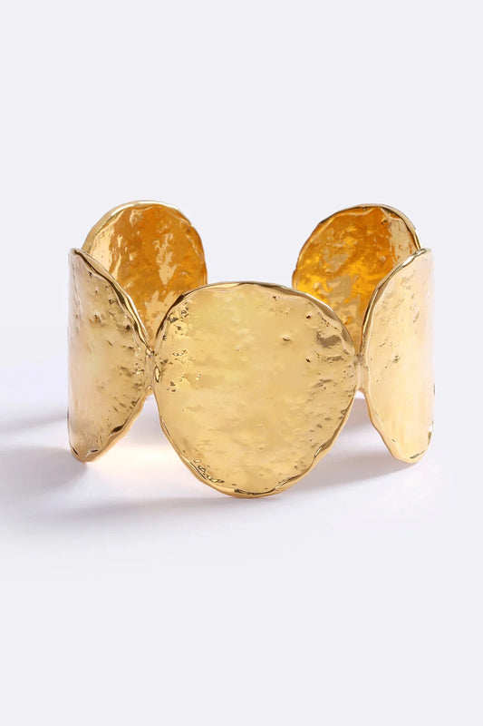 Sunset Hour Arm Cuff Gold by Emma Pills - hammered gold cuff bracelet with molten design, designed for a bold sculptural statement.
