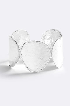 Sunset Hour Arm Cuff Silver by Emma Pills - hammered silver cuff bracelet with molten design, designed for a bold sculptural statement.