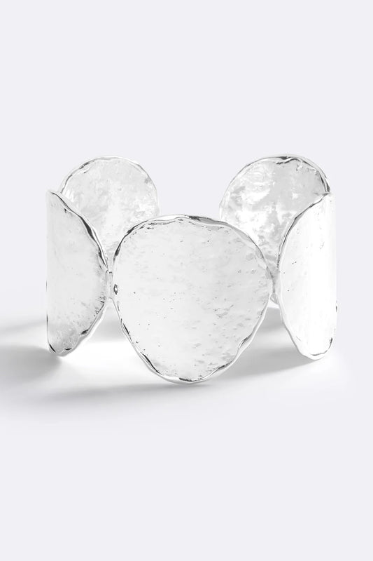 Sunset Hour Arm Cuff Silver by Emma Pills - hammered silver cuff bracelet with molten design, designed for a bold sculptural statement.