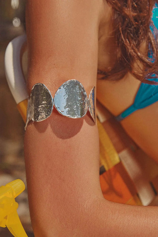 Sunset Hour Arm Cuff Silver by Emma Pills - hammered silver cuff bracelet with molten design, designed for a bold sculptural statement.