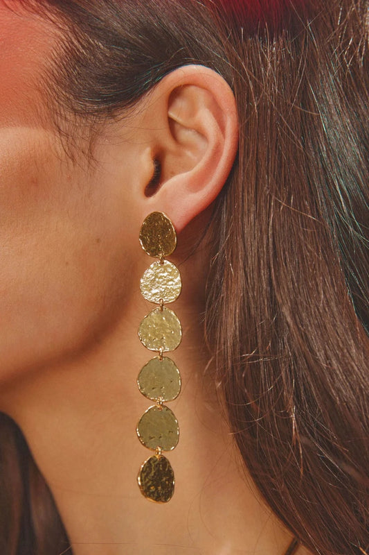 Sunset Hour Earrings Gold by Emma Pills - long gold drop earrings with hammered texture, designed for a bold statement look.
