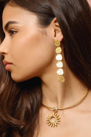 Sunset Hour Earrings Gold by Emma Pills - long gold drop earrings with hammered texture, designed for a bold statement look.