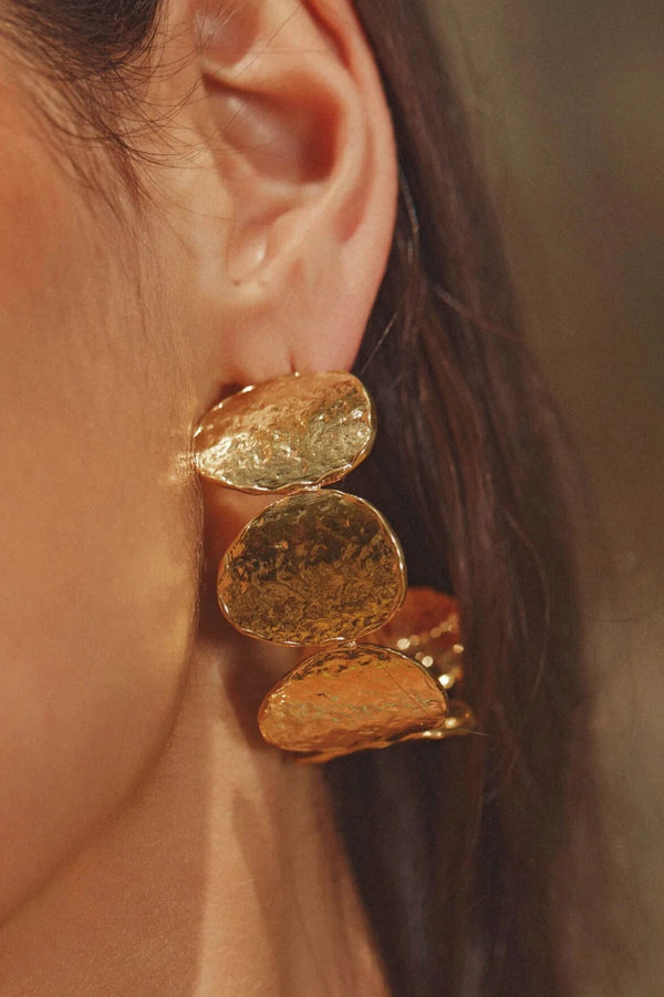 Sunset Hour Hoops Gold by Emma Pills - oversized gold hoop earrings with hammered texture, designed for a bold statement look.