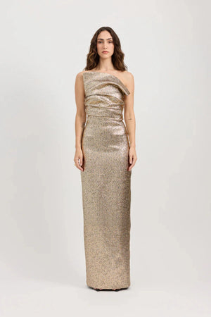 Tacoma Dress by Tojhà, a metallic champagne strapless gown with fold-over neckline, side tucks, and back split for sculptural elegance.