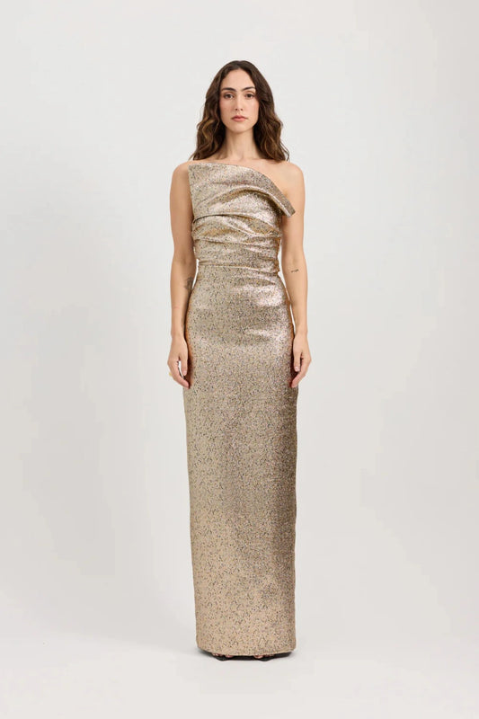 Tacoma Dress by Tojhà, a metallic champagne strapless gown with fold-over neckline, side tucks, and back split for sculptural elegance.