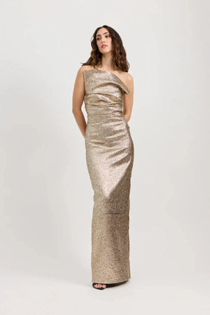 Tacoma Dress by Tojhà, a metallic champagne strapless gown with fold-over neckline, side tucks, and back split for sculptural elegance.