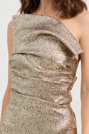 Tacoma Dress by Tojhà, a metallic champagne strapless gown with fold-over neckline, side tucks, and back split for sculptural elegance.