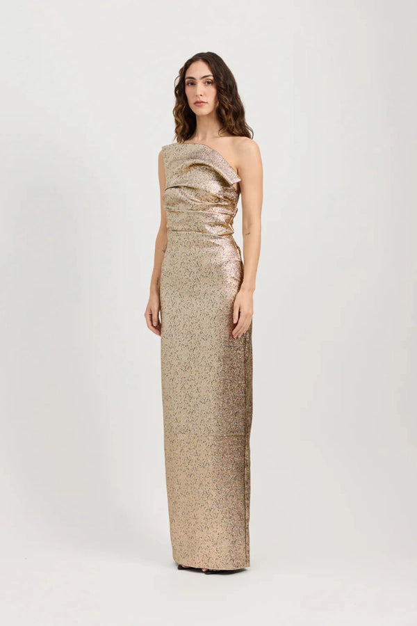 Tacoma Dress by Tojhà, a metallic champagne strapless gown with fold-over neckline, side tucks, and back split for sculptural elegance.
