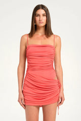 Tanner Mini Dress Watermelon by Benni, mini with straight neckline, open back and cowl skirt, perfect for parties or summer nights.