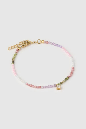 Taylor Bracelet by Arms of Eve, vibrant gold bracelet with colourful zircon stones and charm detail for effortless day-to-night sparkle.
