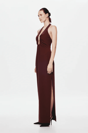 The 'Alusia' Dress Port by Misha, stretch twill maxi with sculptural halter neckline, bust cutout, side split, slim fit, cold hand wash.