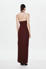 The 'Alusia' Dress Port by Misha, stretch twill maxi with sculptural halter neckline, bust cutout, side split, slim fit, cold hand wash.