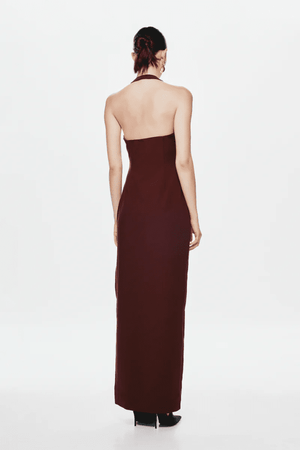 The 'Alusia' Dress Port by Misha, stretch twill maxi with sculptural halter neckline, bust cutout, side split, slim fit, cold hand wash.