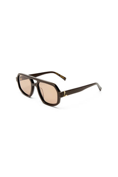 The Banks Sunglasses Dark Chocolate by Luv Lou – oversized aviator with gold hardware and brown tint lenses in premium dark chocolate finish.
