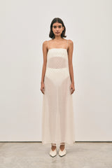 The Camilla Dress Beaded Ivory by Solaqua – sheer beaded maxi dress with geometric embellishments and elegant drape.