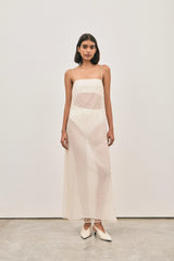 The Camilla Dress Beaded Ivory by Solaqua – sheer beaded maxi dress with geometric embellishments and elegant drape.