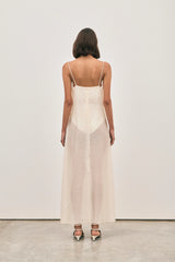The Camilla Dress Beaded Ivory by Solaqua – sheer beaded maxi dress with geometric embellishments and elegant drape.