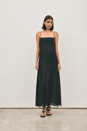 The Camilla Dress Beaded Noir by Solaqua – sheer beaded maxi dress with geometric embellishments and elegant drape.
