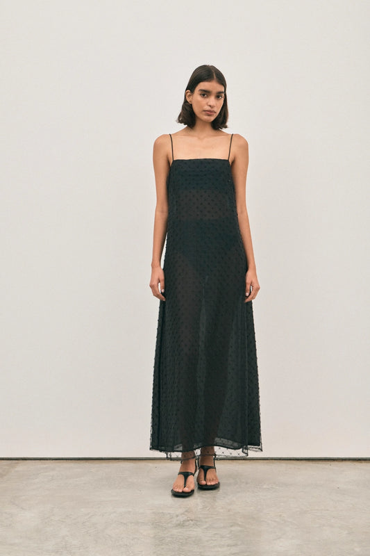 The Camilla Dress Beaded Noir by Solaqua – sheer beaded maxi dress with geometric embellishments and elegant drape.