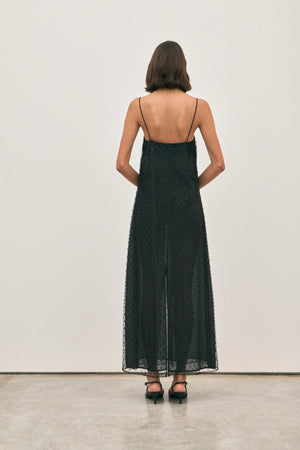 The Camilla Dress Beaded Noir by Solaqua – sheer beaded maxi dress with geometric embellishments and elegant drape.
