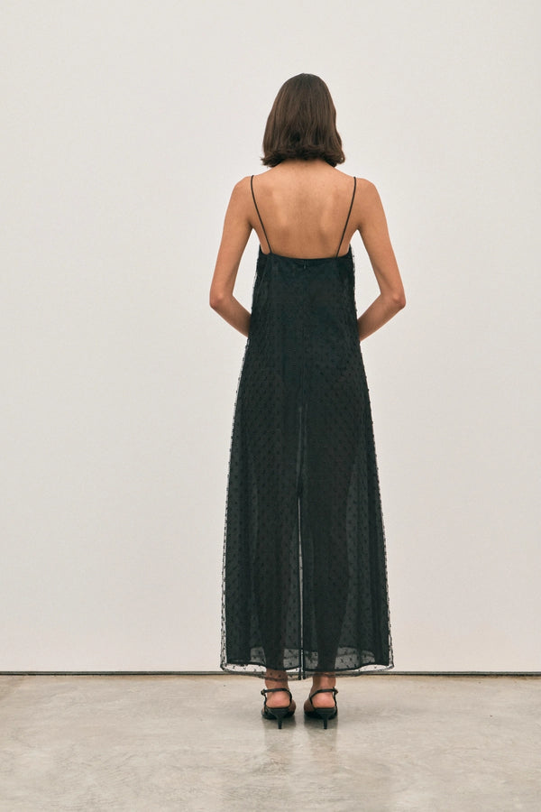 The Camilla Dress Beaded Noir by Solaqua – sheer beaded maxi dress with geometric embellishments and elegant drape.