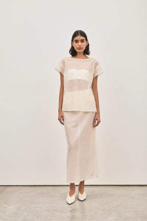 The Chelsea Beaded Top Ivory by Solaqua – sheer beaded top with geometric embellishments and detachable camisole.