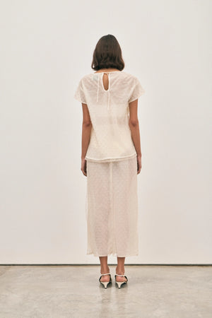 The Chelsea Beaded Top Ivory by Solaqua – sheer beaded top with geometric embellishments and detachable camisole.