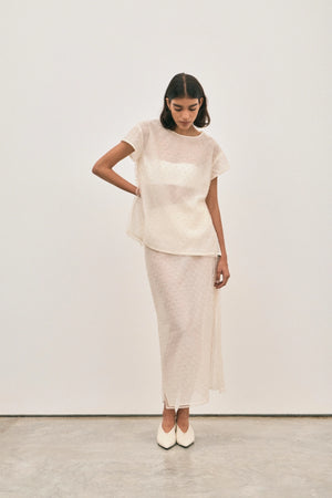 The Chelsea Beaded Top Ivory by Solaqua – sheer beaded top with geometric embellishments and detachable camisole.