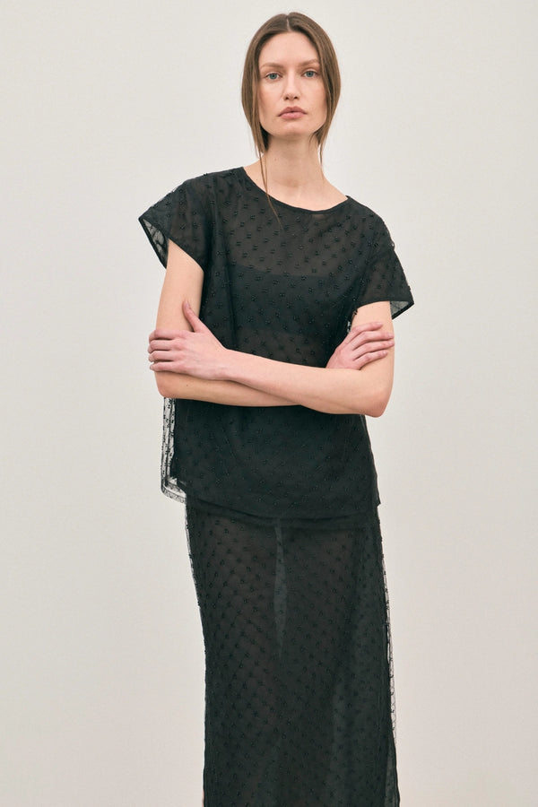 The Chelsea Beaded Top Noir by Solaqua – sheer beaded top with geometric embellishments and detachable camisole.