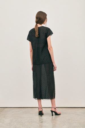 The Chelsea Beaded Top Noir by Solaqua – sheer beaded top with geometric embellishments and detachable camisole.