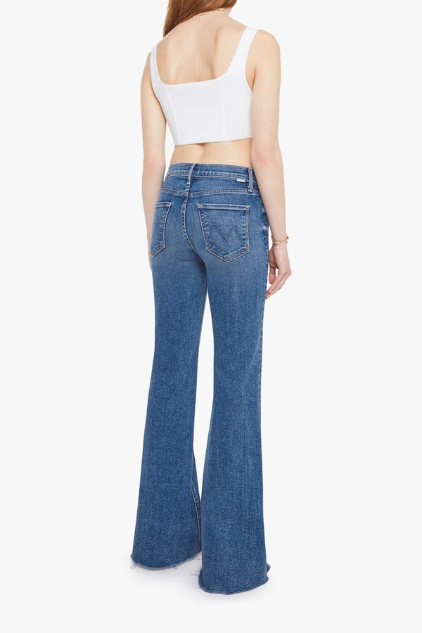 The Doozy Sneaky Fray Let’s Split by MOTHER, high-rise flared jeans with frayed hems and soft fading for an effortless vintage look.