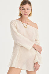 The Eloise Beaded Mini Ivory by Solaqua – sheer beaded mini dress with off shoulder neckline and oversized fit.