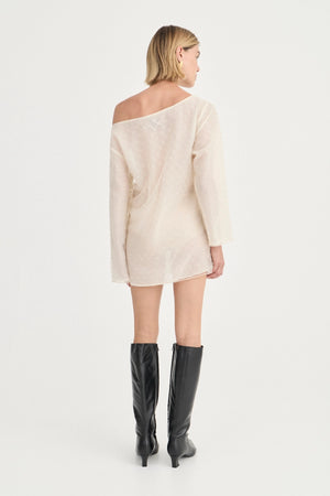The Eloise Beaded Mini Ivory by Solaqua – sheer beaded mini dress with off shoulder neckline and oversized fit.